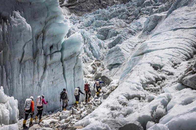 Ang Dorjee scales Everest for 23rd time; Garrett makes 14th ascent