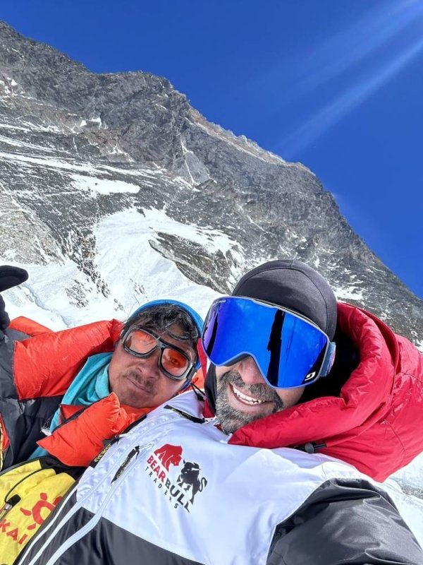 Canadian trader Andrew Aziz scales Everest