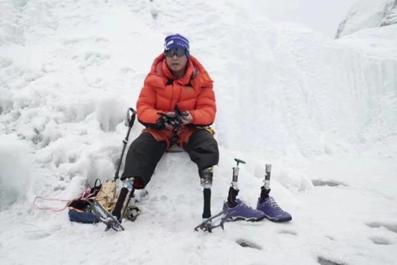 Double amputee Chinese stands atop Mt Everest; Nima Jangmu becomes first Nepali woman to climb Everest, Lhotse this season