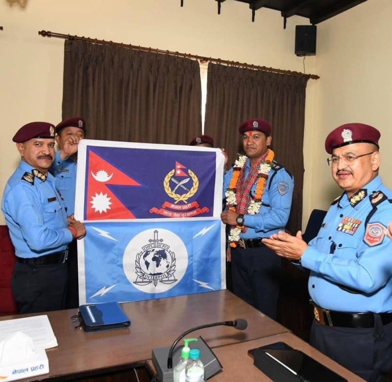 Nepal police scale Mt Everest marking Interpol's 100th anniversary