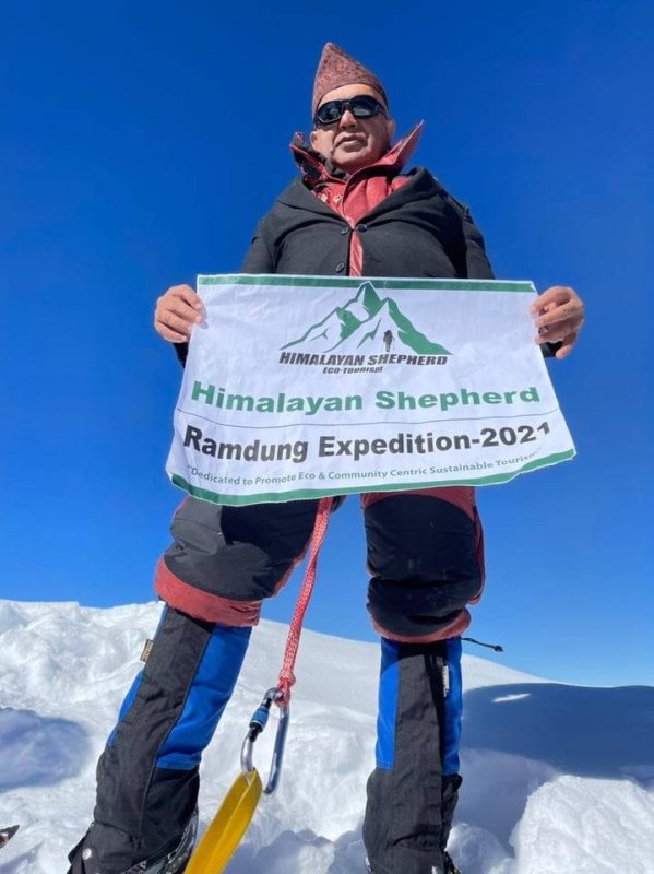Nepali lawyers scale Mt Ramdung to draw attention of climate change to world leaders attending COP-26