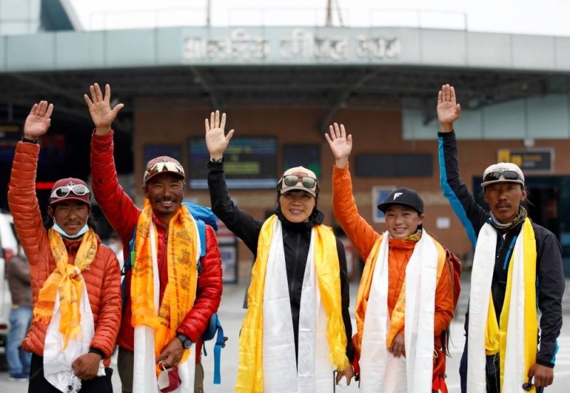 Tired but safe: Everest record-making climbers return